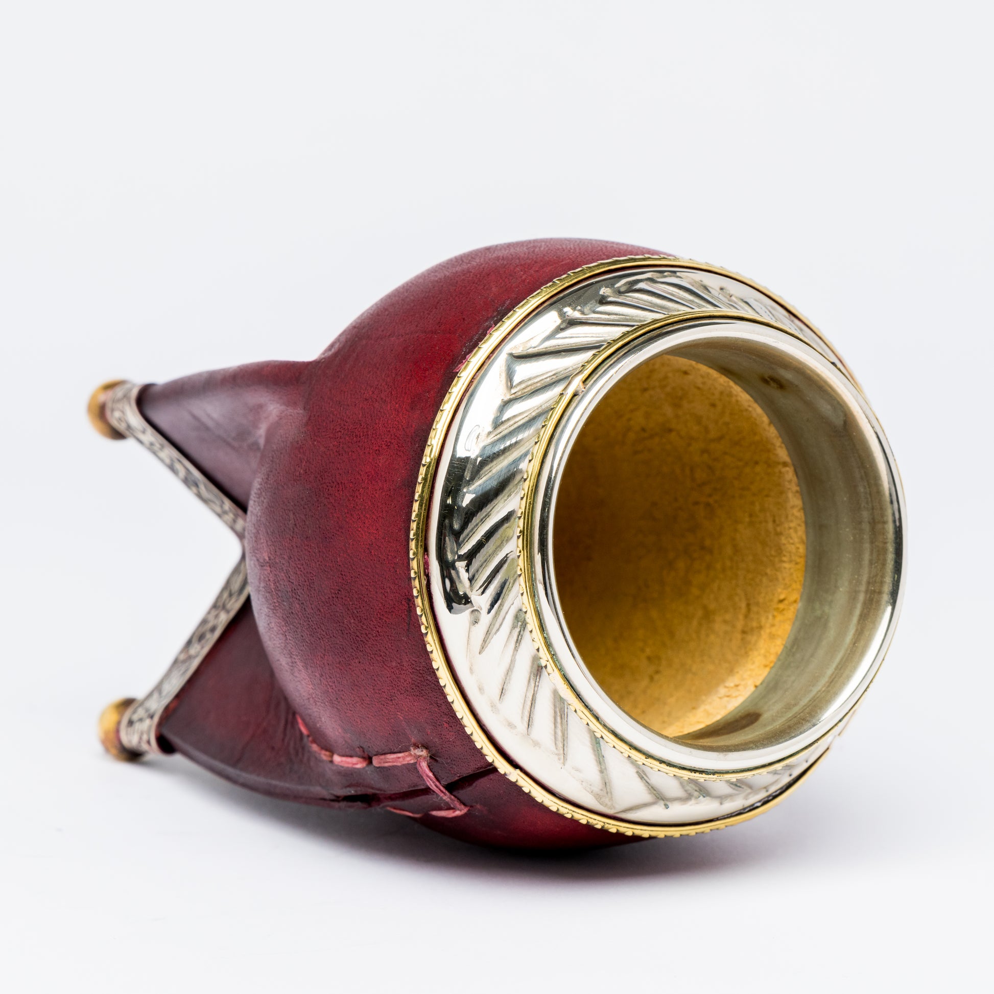 Brown premium torpedo mate gourd standing sideways to reflect the interior of calabash